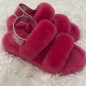 NWOT. Fluffy hot pink Ugg slippers with ankle straps. Size W6.
